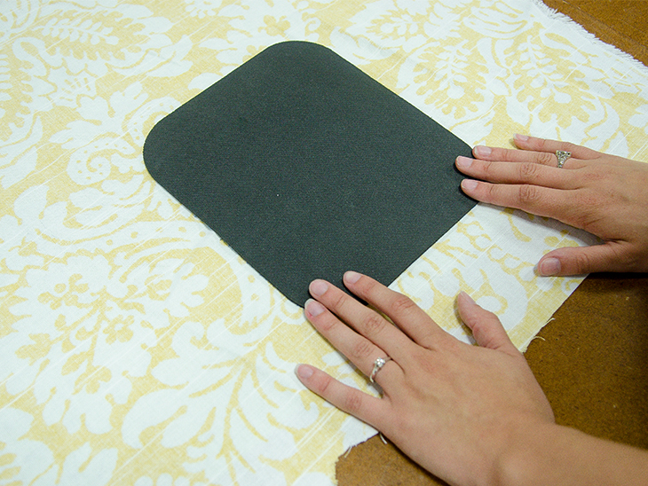 Glue the mouse pad to your desired location on the back of the fabric.